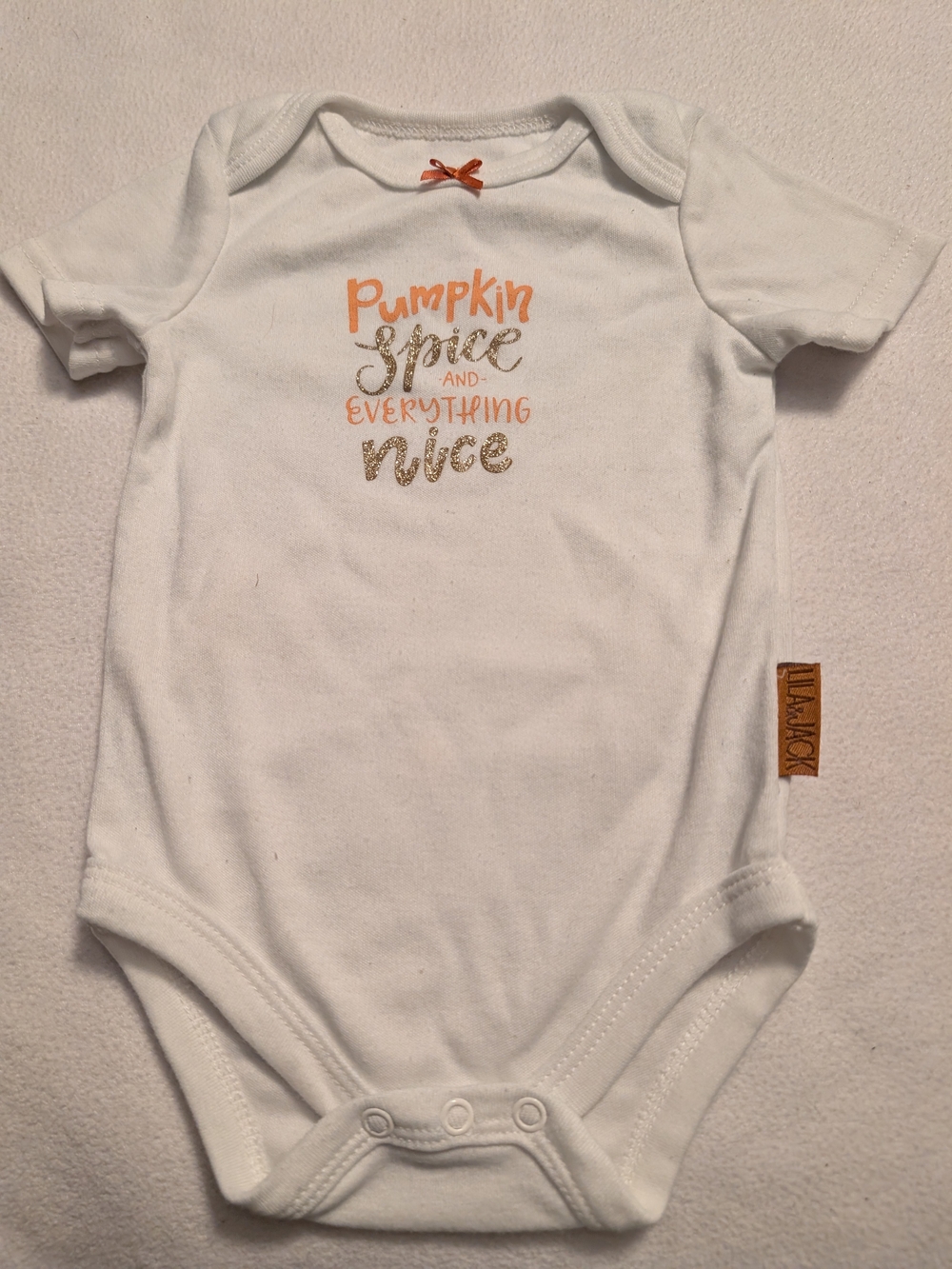 Target White Baby One-Piece with Orange and Gold 'Pumpkin Spice' Text
